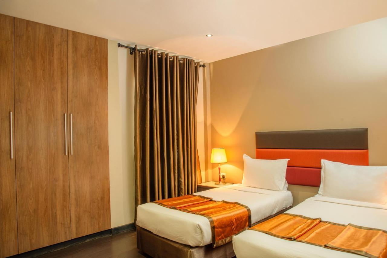 Tagore Apartments Кампала Экстерьер фото