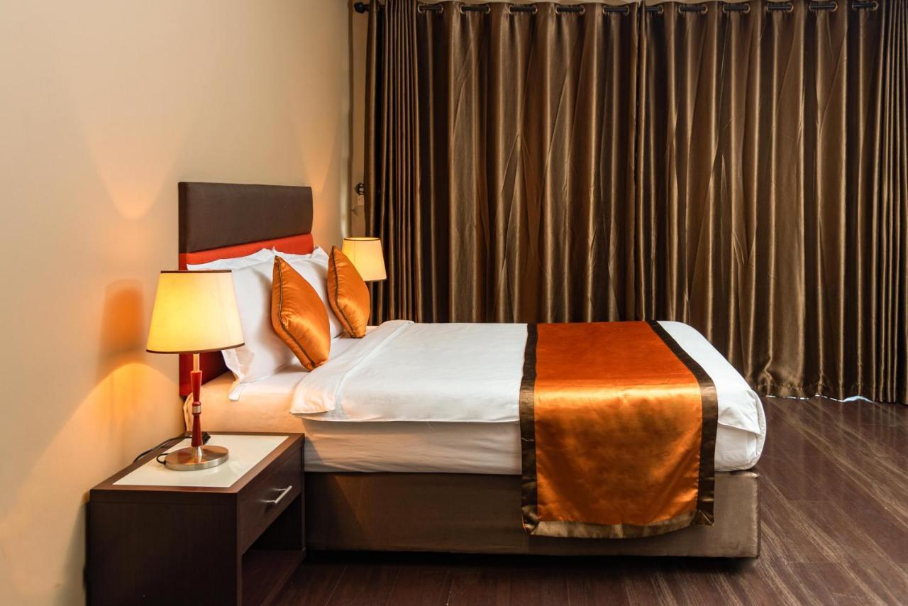 Tagore Apartments Кампала Экстерьер фото