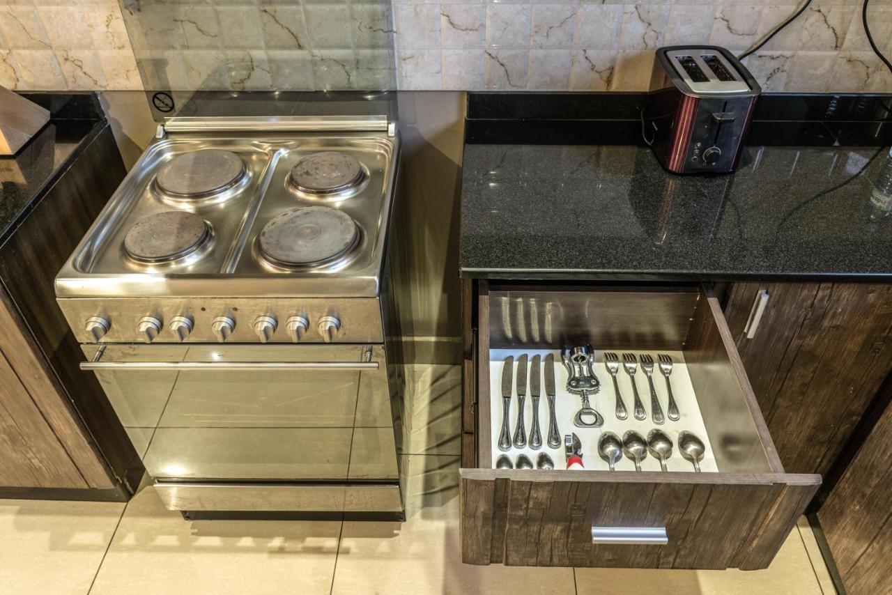 Tagore Apartments Кампала Экстерьер фото