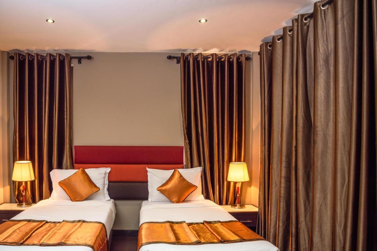 Tagore Apartments Кампала Экстерьер фото