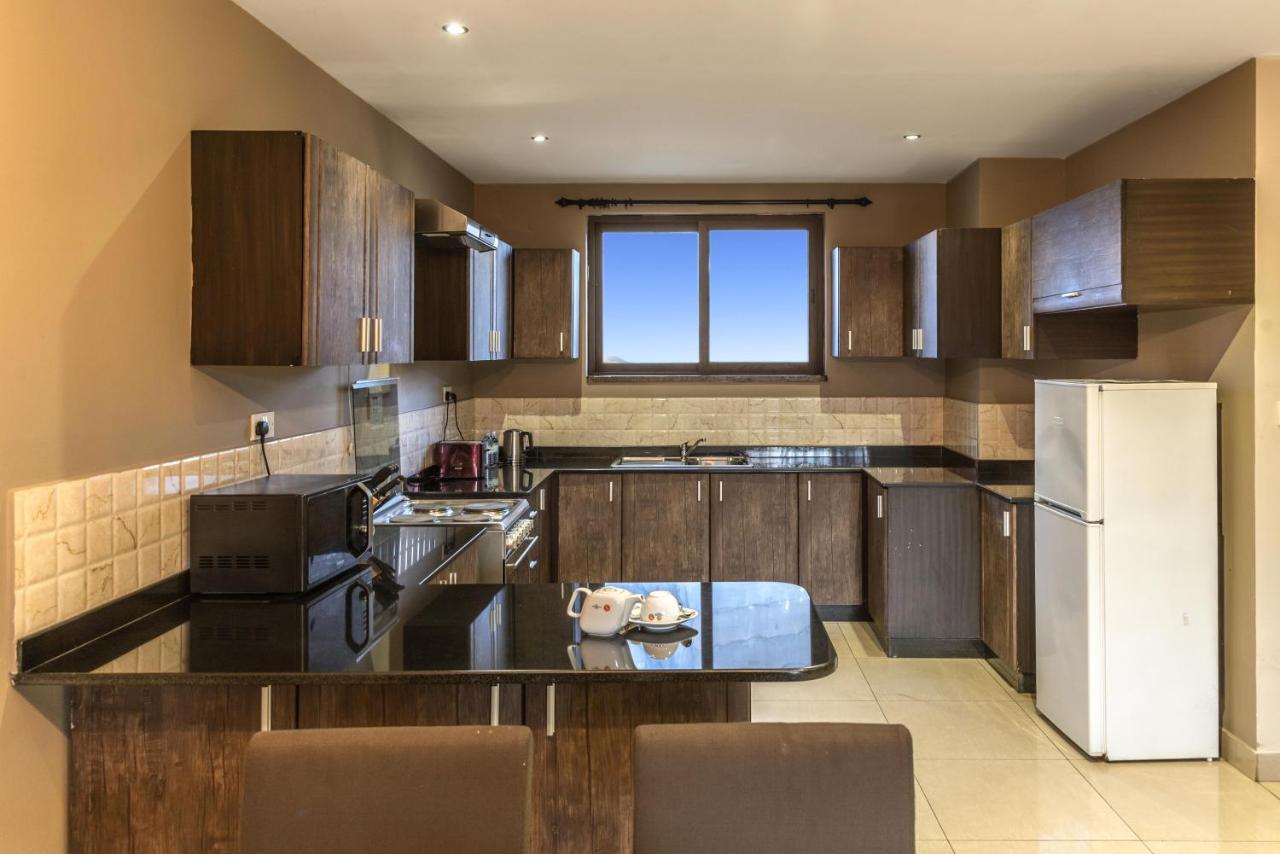 Tagore Apartments Кампала Экстерьер фото